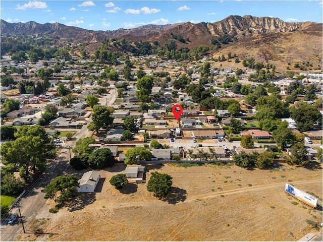 drone / aerial view featuring a mountain view