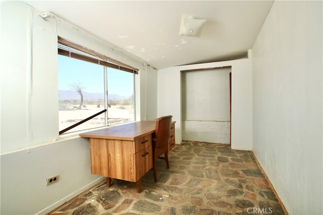 office featuring vaulted ceiling