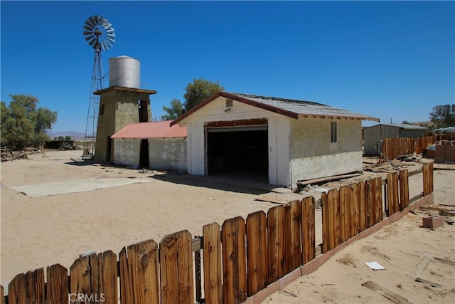 exterior space featuring an outdoor structure