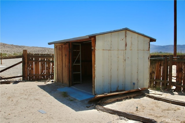 view of outdoor structure featuring a mountain view