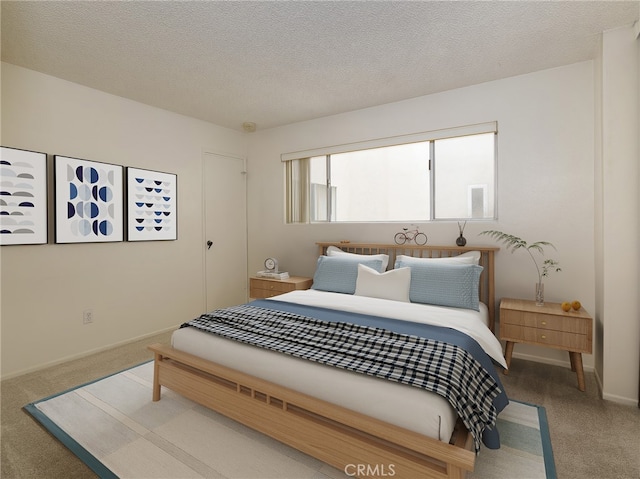 carpeted bedroom with a textured ceiling