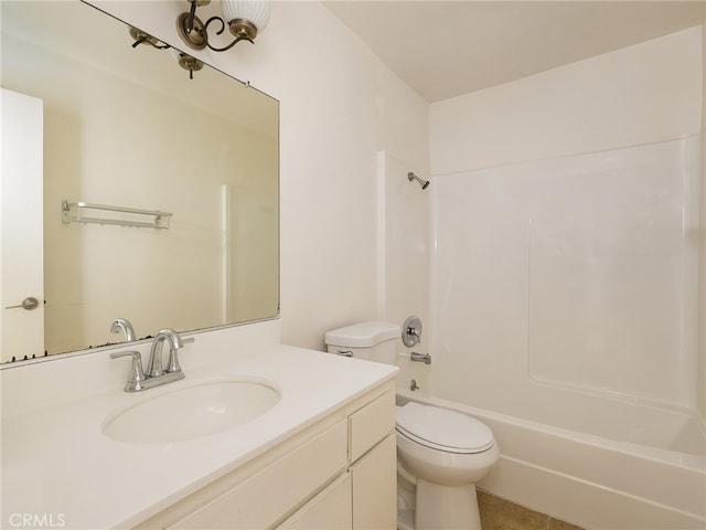 full bathroom featuring shower / bathing tub combination, vanity, tile patterned flooring, and toilet