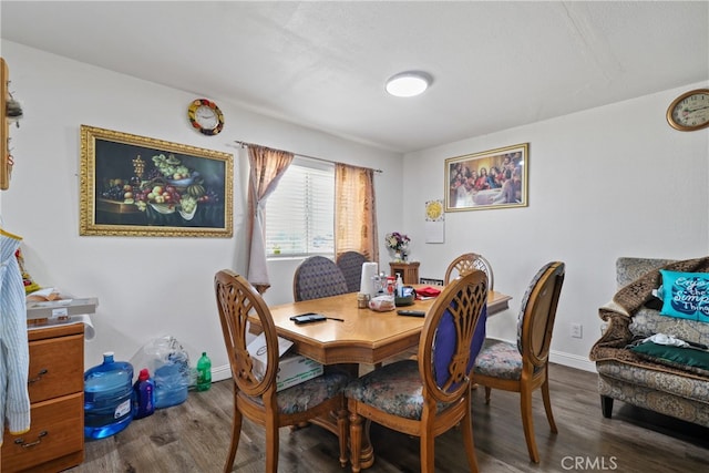 dining area featuring hardwood / wood-style flooring