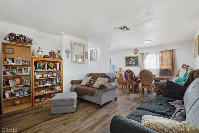 living room with dark hardwood / wood-style floors