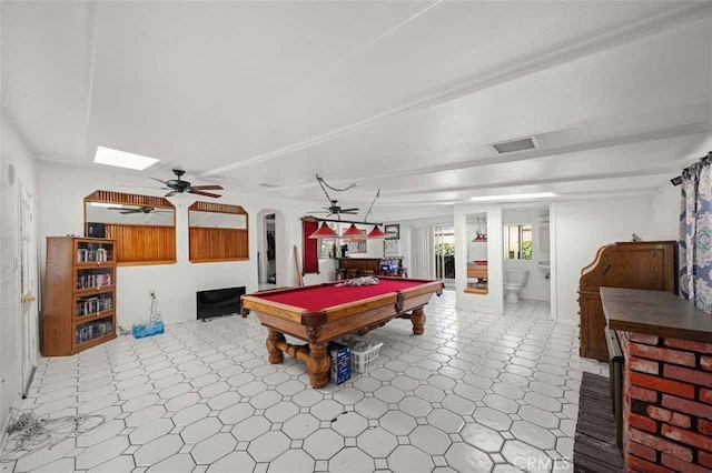 game room with ceiling fan and pool table