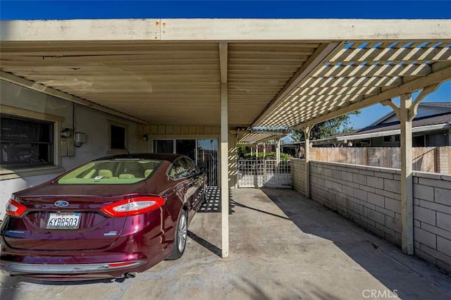 exterior space with a carport