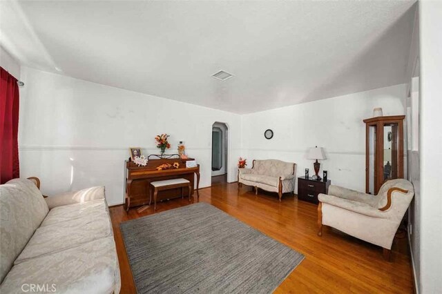 living room with wood-type flooring