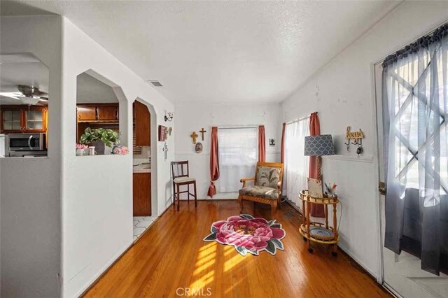 living area featuring hardwood / wood-style floors