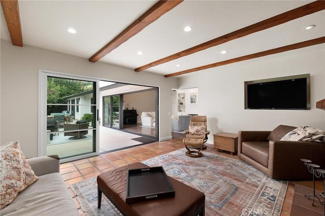 living room with beam ceiling and light tile patterned flooring