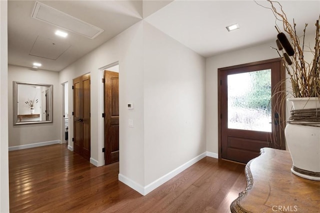 foyer entrance featuring dark hardwood / wood-style floors