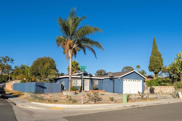 single story home with a garage