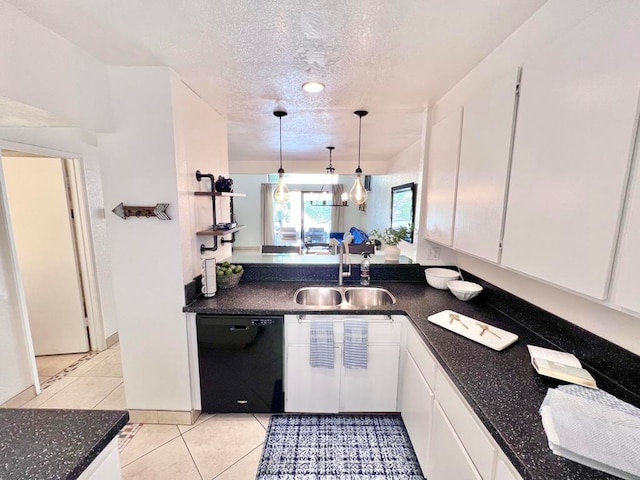 kitchen featuring dishwasher, light tile patterned flooring, white cabinets, and sink