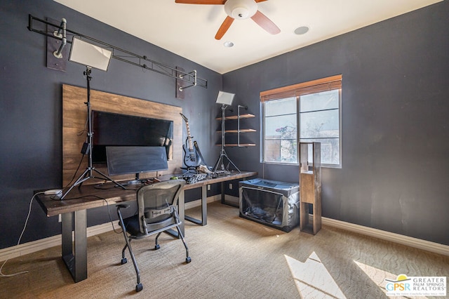 carpeted office with ceiling fan