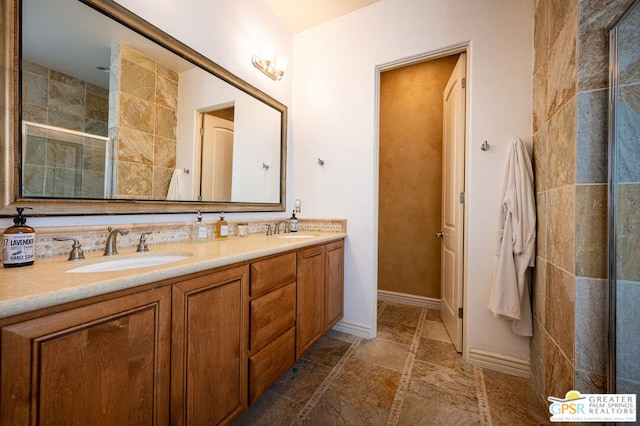 bathroom with vanity and walk in shower