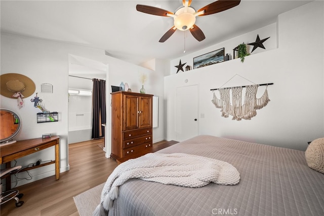 bedroom featuring ceiling fan and hardwood / wood-style floors