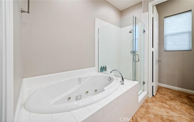 bathroom with plus walk in shower and tile patterned flooring