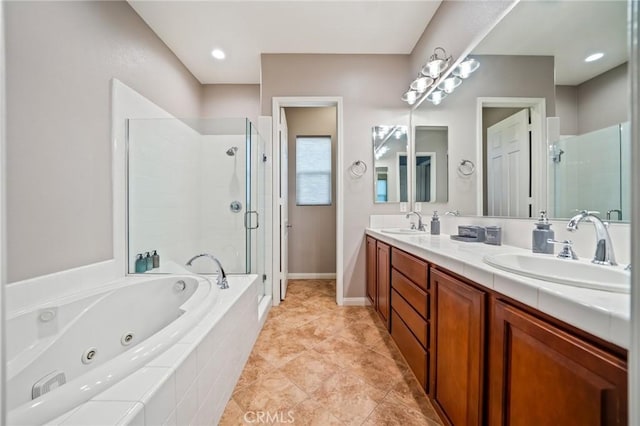 bathroom with plus walk in shower, vanity, and tile patterned flooring