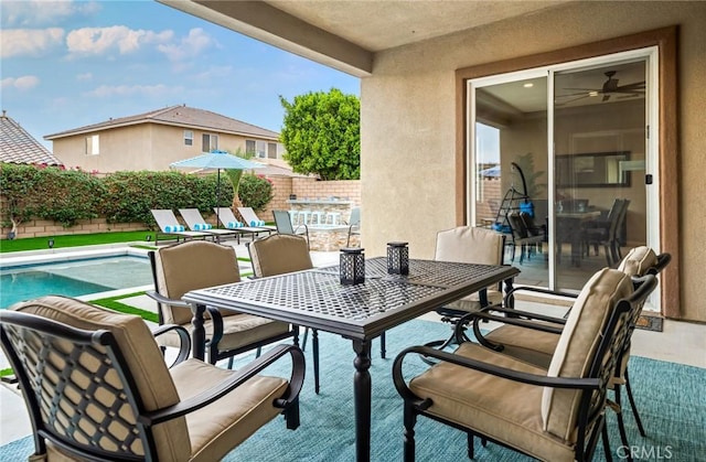 view of patio featuring a fenced in pool