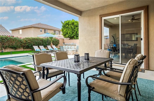 view of patio featuring a fenced in pool