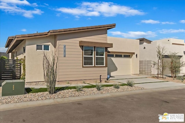 view of property exterior with a garage