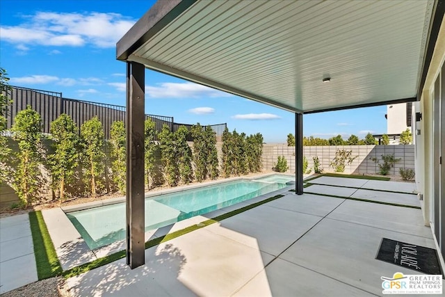 view of pool with a patio