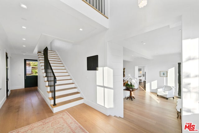 stairway with wood-type flooring