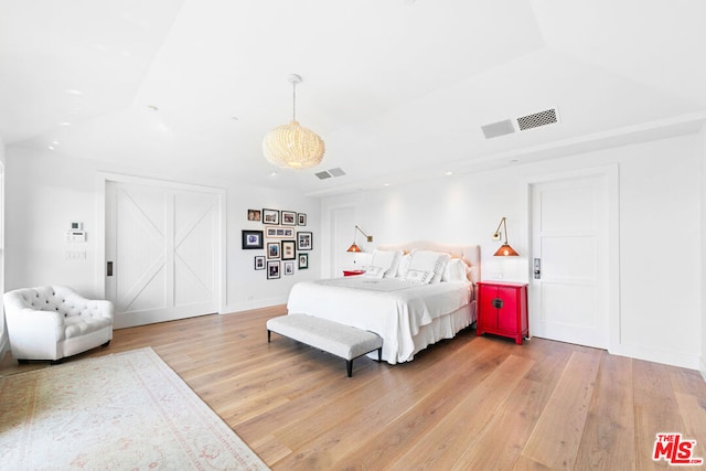 bedroom featuring hardwood / wood-style floors