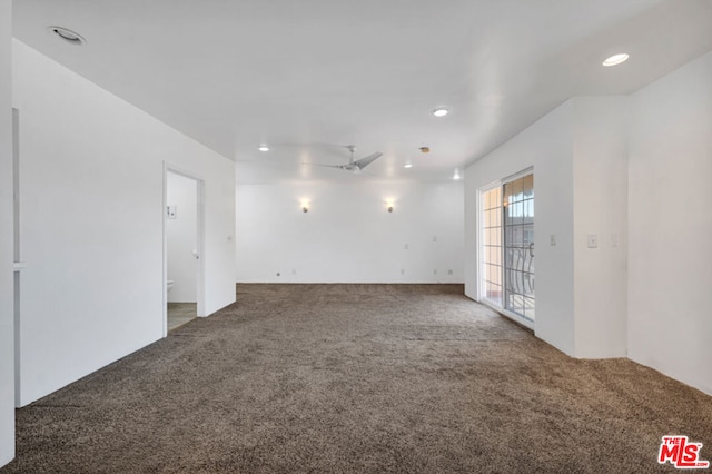 carpeted empty room with ceiling fan