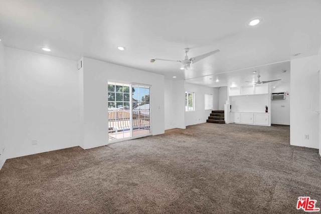 unfurnished living room with carpet floors and ceiling fan