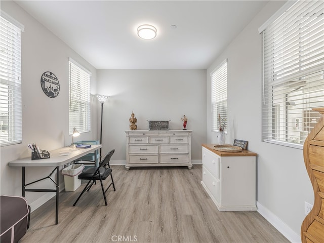 office space featuring light hardwood / wood-style floors