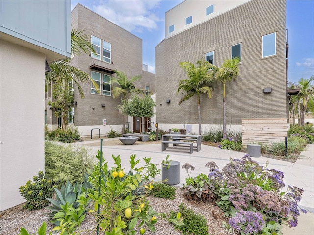 view of community with a patio area