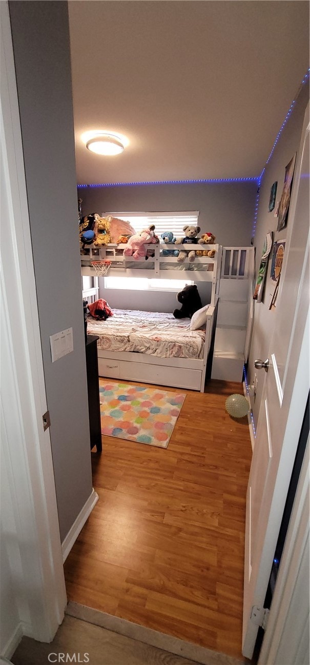 bedroom featuring hardwood / wood-style flooring