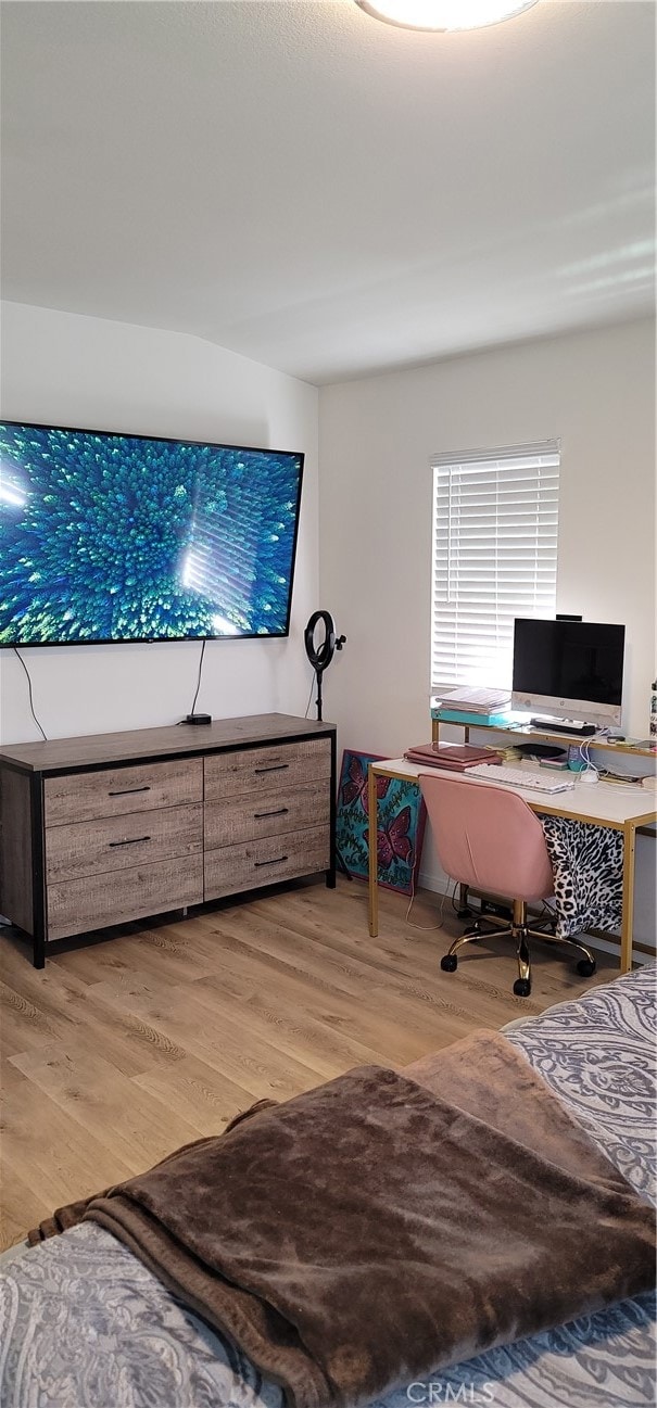 office area with light hardwood / wood-style floors