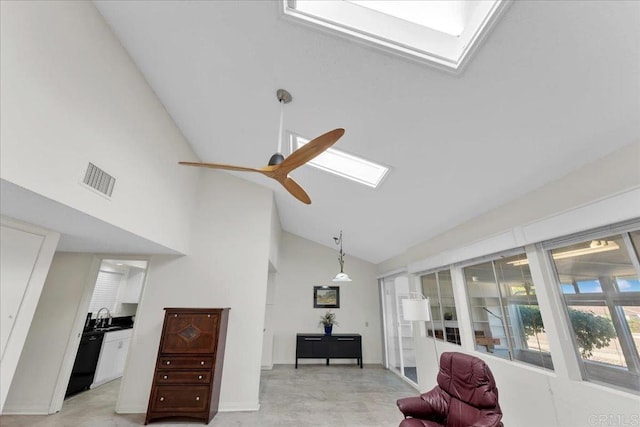 3685 Vista Campana N Unit 56, Oceanside, CA 92057 - living room with a skylight, high vaulted ceiling, and a ceiling fan