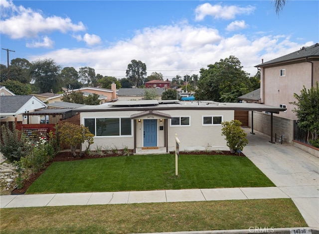 view of front of home with a front lawn