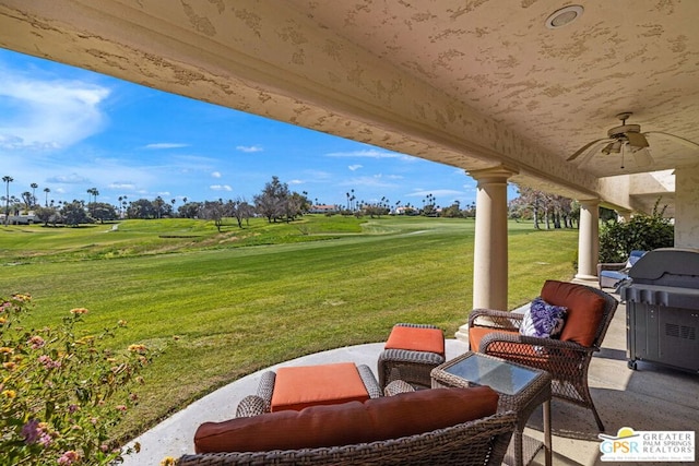 view of patio / terrace with ceiling fan and a grill