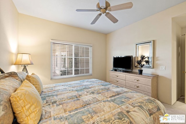 bedroom featuring ceiling fan and light colored carpet