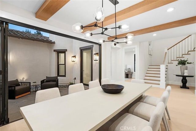 dining room featuring a chandelier