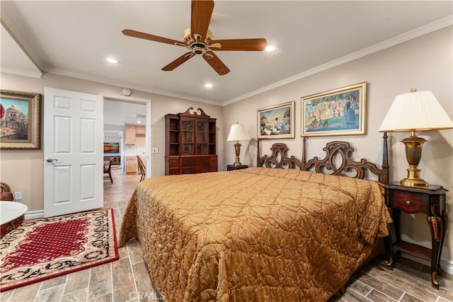 bedroom featuring ornamental molding, hardwood / wood-style floors, and ceiling fan