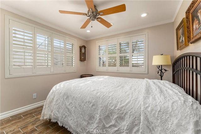 bedroom featuring ceiling fan, ornamental molding, and dark hardwood / wood-style flooring