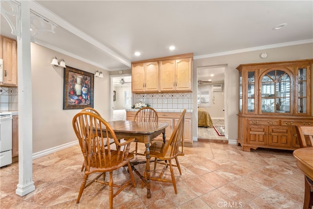 tiled dining area featuring ornamental molding and a wall mounted AC