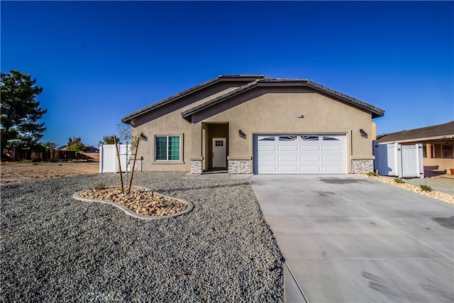 single story home with a garage