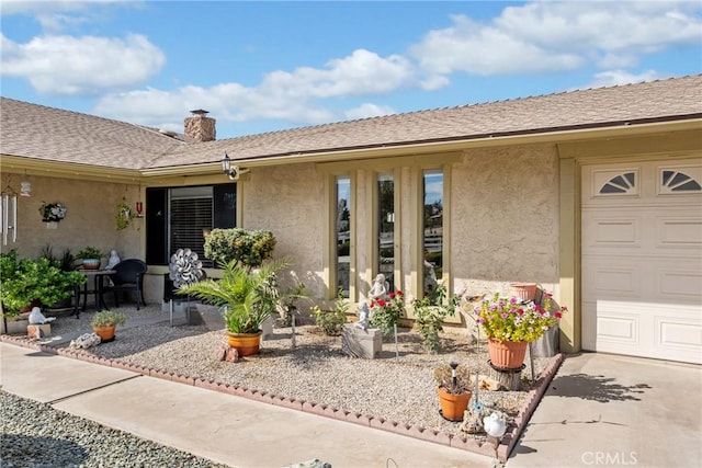 property entrance featuring a garage