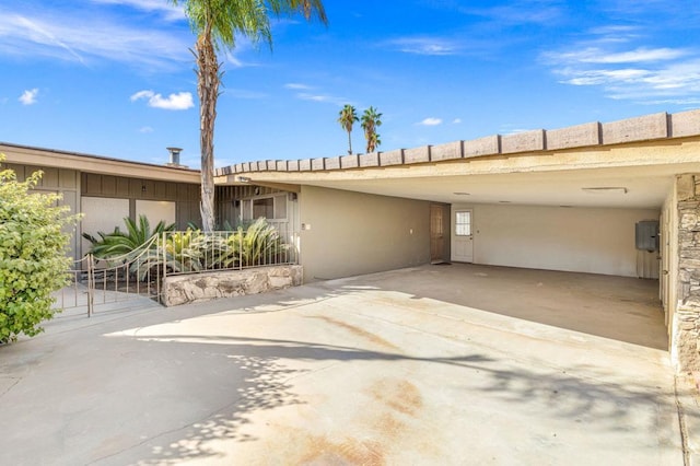 ranch-style home with a patio