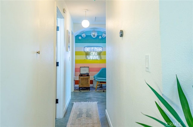 corridor featuring concrete flooring