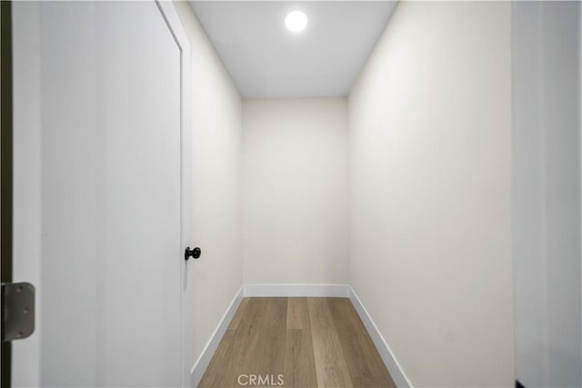 corridor featuring light hardwood / wood-style flooring