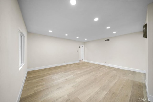 empty room featuring light hardwood / wood-style floors