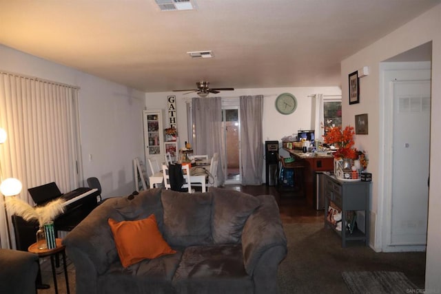 living room featuring ceiling fan