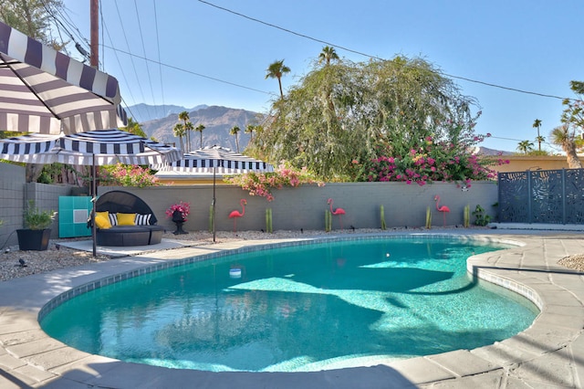 view of pool with a mountain view