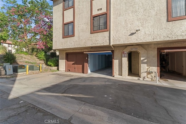 exterior space with a garage